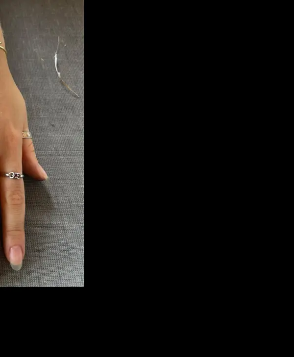 Close-up of handmade silver rings and bracelet